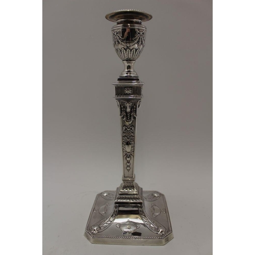 3 - James Deakin & Sons, A pair of late Victorian silver candlesticks of Adam design, the urn form sconc... 