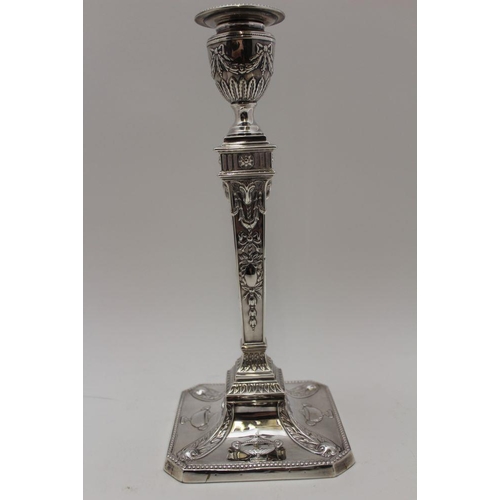 3 - James Deakin & Sons, A pair of late Victorian silver candlesticks of Adam design, the urn form sconc... 