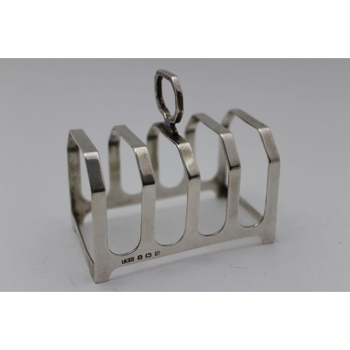 31 - Israel Sigmund Greenburg, a pair of Art Deco design silver toast racks, Birmingham 1936/38, 7.5cm x ... 