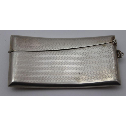 32 - William Devenport, A Victorian design silver visiting card case of curved form, engine turned decora... 