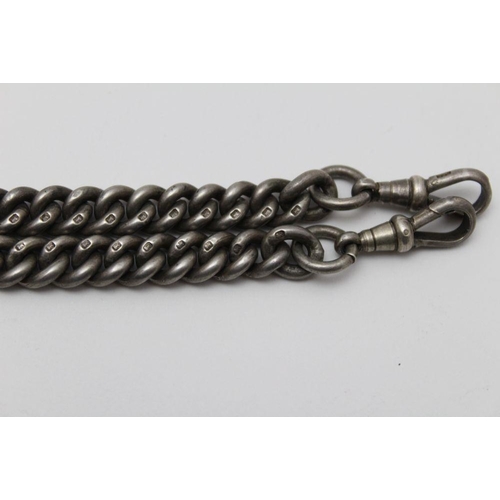 43 - An early 20th century silver double Albert watch chain, heavy graduated link design, with 'T' bar an... 