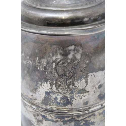 5 - A George II silver lidded tankard, having domed cover with scrolled thumbpiece, the tapering cylindr... 