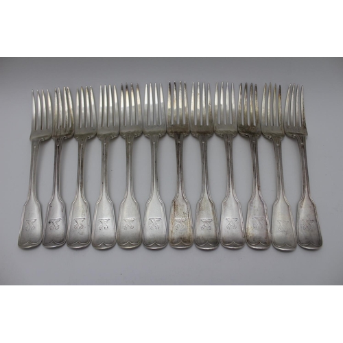 50 - John Aldwinckle and Thomas Slater, a set of twelve fiddle & thread pattern silver dinner forks, cres... 