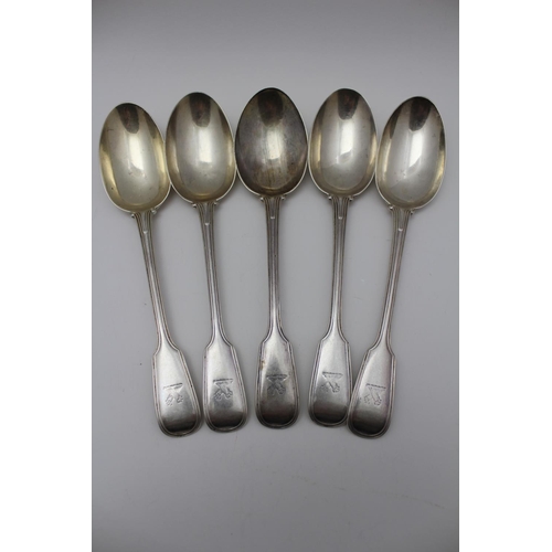 52 - John Aldwinckle and Thomas Slater, a set of five fiddle & thread pattern silver soup / table spoons,... 