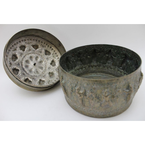 9 - An early 20th century Far Eastern embossed metal bowl & cover, the cover has handle finial of a danc... 