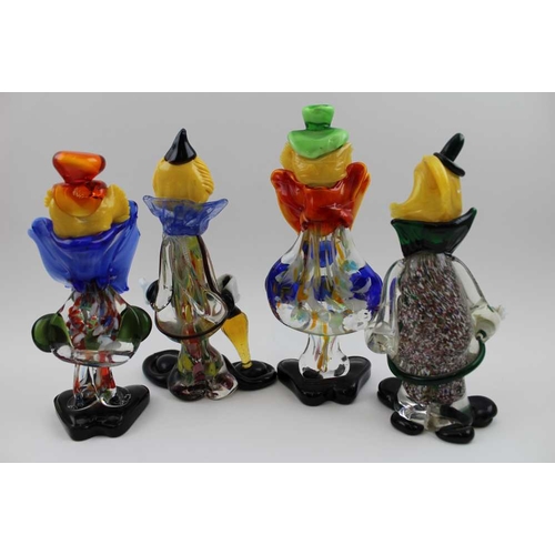 100 - A collection of four Murano glass clowns, the tallest 23cm