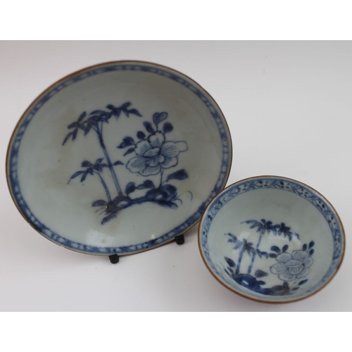 79 - A Chinese cafe-au-lait blue & white porcelain tea bowl & saucer from the Nanking Cargo 1752, bearing... 