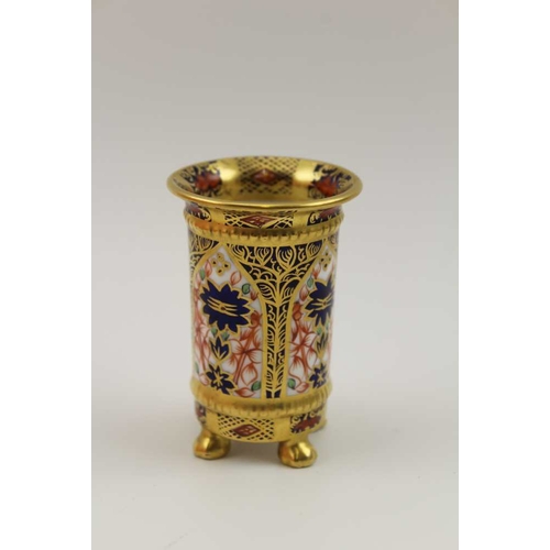 82 - A Royal Crown Derby miniature cylindrical vase in the Imari pattern, 6.5cm high, a miniature Imari j... 