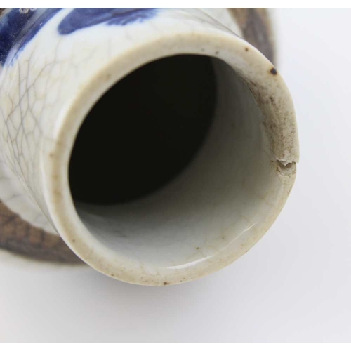 88 - A 20th century Chinese ceramic vase, with crackle glaze, of baluster form, cobalt painted with Bejin... 