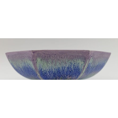 94 - An Art Deco Shelley ceramic bowl of octagonal form, glazed in a blue, green, and purple drip pattern... 