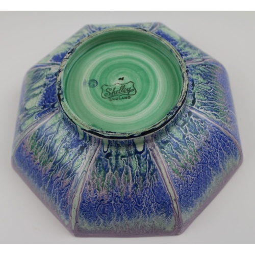 94 - An Art Deco Shelley ceramic bowl of octagonal form, glazed in a blue, green, and purple drip pattern... 