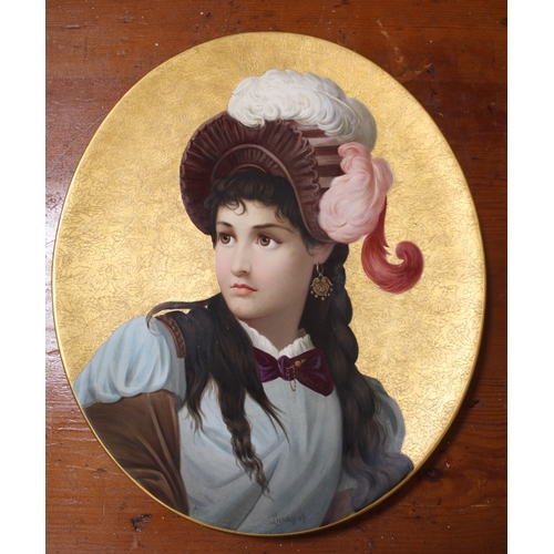 98 - A late 19th century Crown Derby ceramic oval wall plaque, painted by George Landgraf, depicts a beau... 