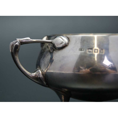 100 - Charles Edwards, a silver cream jug, of Art Nouveau design, London 1922, 100g