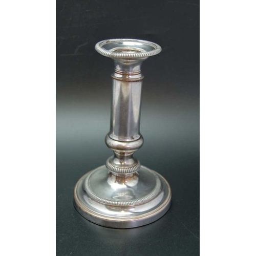 108 - A pair of early 19th century Old Sheffield plate telescopic candlesticks, on circular bases, extende... 