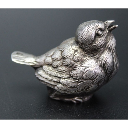 129 - A French cast silver chick salt, 3cm high, bears hallmark on tail, 25g