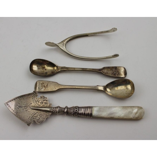 133 - A Georgian silver toddy ladle, embossed decoration with side pouring lip, inset to the base a George... 