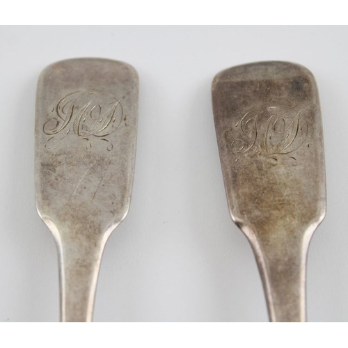 149 - William Welch, a pair of silver serving spoons, fiddle pattern handles, monogrammed, Exeter 1821, co... 