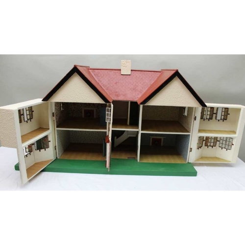 171 - A large dolls house, with a quantity of Mobil furniture