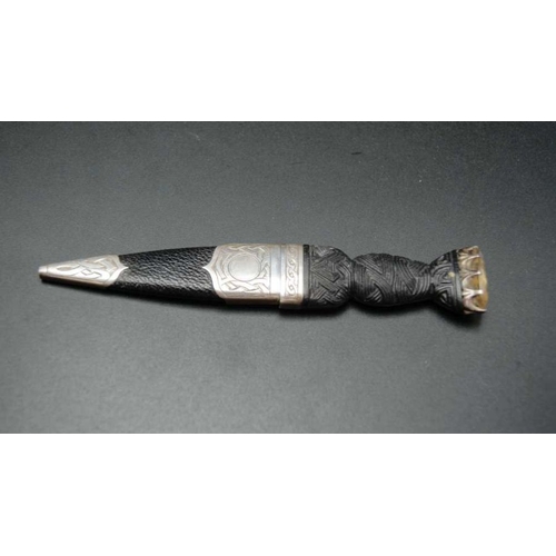 172 - Thomas Kerr Ebbutt, a Scottish skean dhu dagger, having carved wood handle inset Citrine stone, the ... 