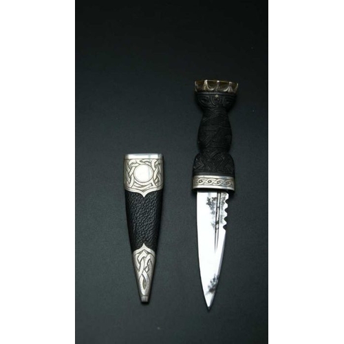 172 - Thomas Kerr Ebbutt, a Scottish skean dhu dagger, having carved wood handle inset Citrine stone, the ... 