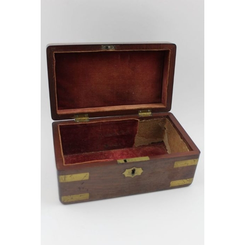 177 - A 19th century mahogany box with brass bands protective corners to the hinged lid, and inset a blind... 