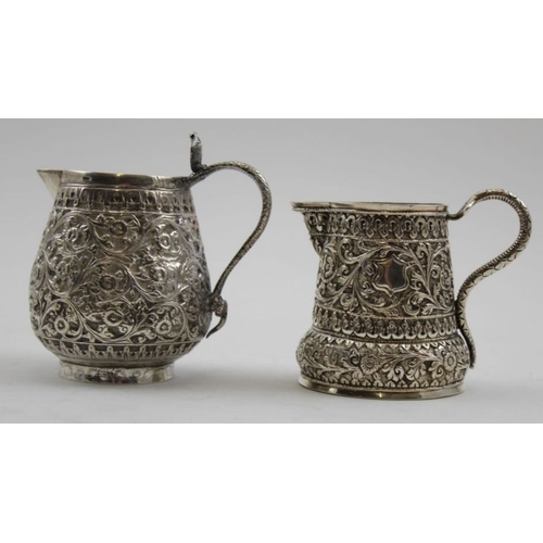 24 - Two Indian Kutch silver cream jugs, c.1890, 201g