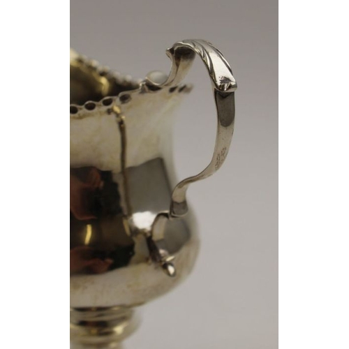 44 - Thomas Shepherd, a George II silver cream jug, London 1758, 93g