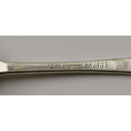 61 - A George III silver caddy spoon, with later inscription to the stem, London 1807,14g