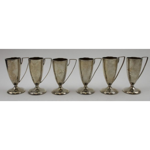 68 - James Deakin & Sons, a set of six silver spirit cups, gilded interiors, Chester 1910, 106g, in silk ... 