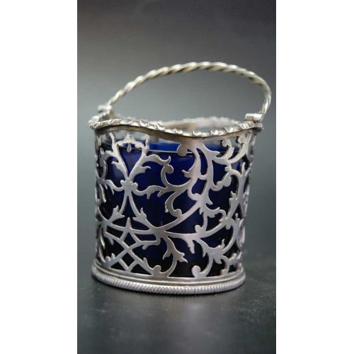 77 - A George III silver sweetmeat basket, with swing handle and pierced decoration, London 1767, 99g, fi... 