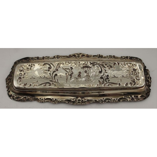 87 - A Victorian rectangular silver tray, embossed with parkland scenes to the centre a minstrel entertai... 