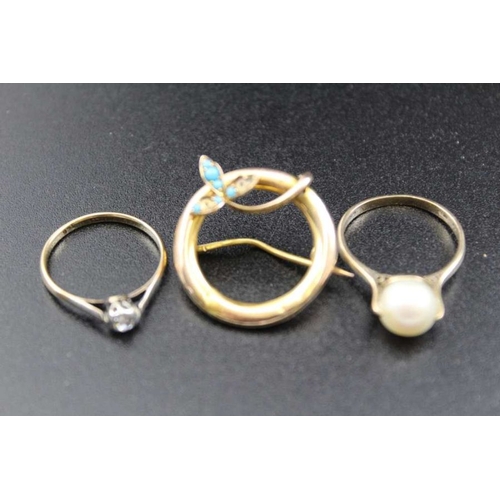 107 - A 9ct gold solitaire diamond ring, a 9ct gold ring mounted with a pearl, and a 9ct gold circular bro... 