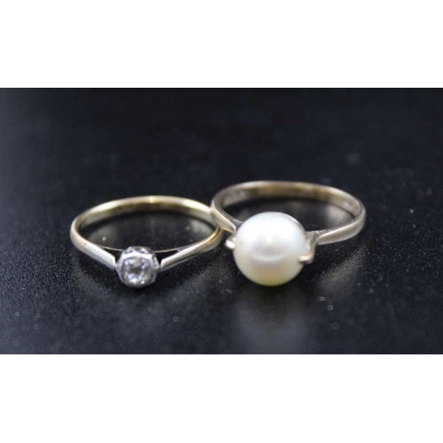 107 - A 9ct gold solitaire diamond ring, a 9ct gold ring mounted with a pearl, and a 9ct gold circular bro... 