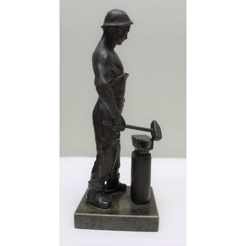 113 - A pair of spelter workmen, a blacksmith and a founder, on polished stone bases, 26cm high, c.1900