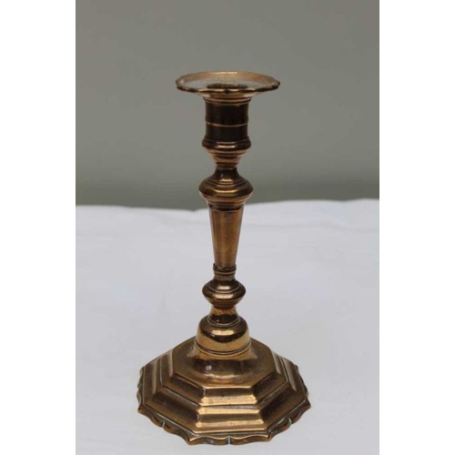 117 - A pair of 19th century Georgian design brass candlesticks, 23cm high, and a pair of Georgian design ... 