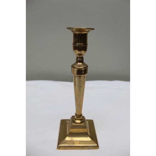 117 - A pair of 19th century Georgian design brass candlesticks, 23cm high, and a pair of Georgian design ... 