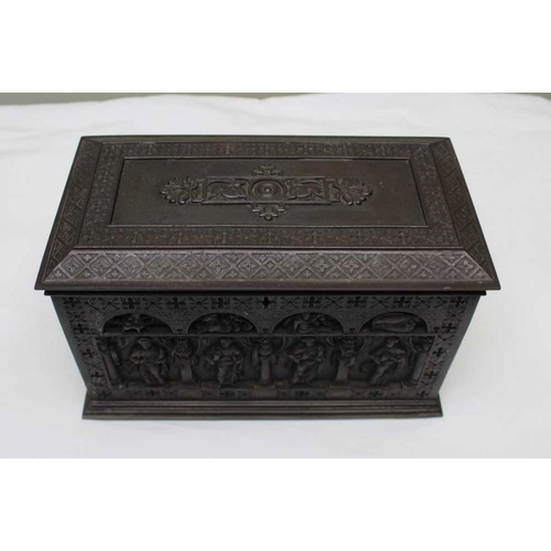 120 - A Gothic design cast iron table casket, figure decoration, the hinged lid reveals a blue fabric upho... 