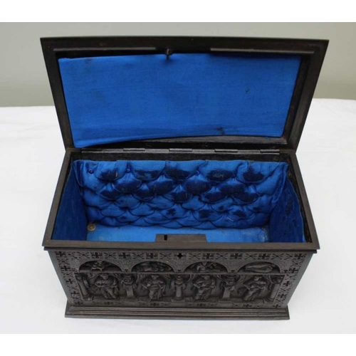 120 - A Gothic design cast iron table casket, figure decoration, the hinged lid reveals a blue fabric upho... 