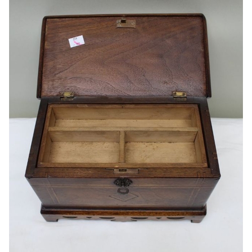 128 - A 19th century mahogany table casket, line inlay, on pierced platform base, the lid opens to reveal ... 