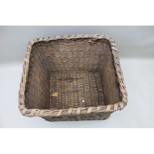 129 - A  log basket bearing the initials BRS (British Rail Southern) with rope handles 67cm tall