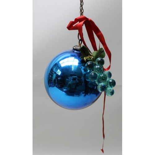 130 - A 19th century blue glass witch ball on a chain, approx. 15cm