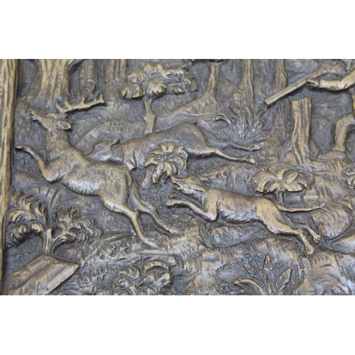 140 - A 19th century carved oak panel stag hunting scene, 26cm x 20cm