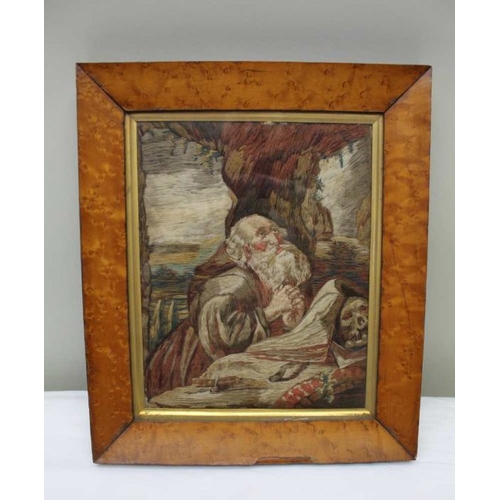 148 - An early 19th century wool work panel, praying saint, maple frame, glazed, 26cm x 23cm