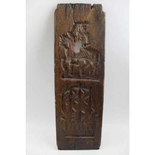 151 - An 18th century Dutch oak gingerbread board, 47cm x 15cm