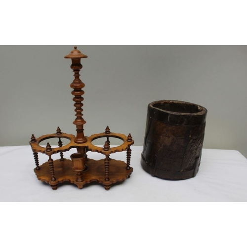 152 - A 19th century treen condiment stand, and a corn measure