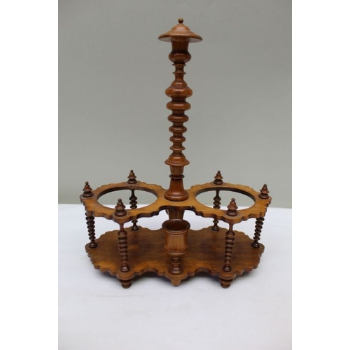 152 - A 19th century treen condiment stand, and a corn measure