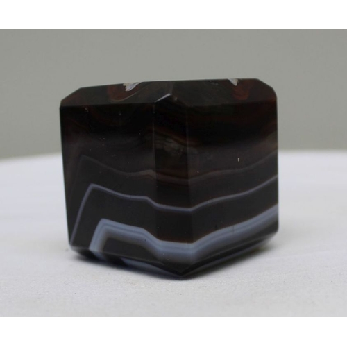 159 - An onyx cube and phallus Roman oil lamp