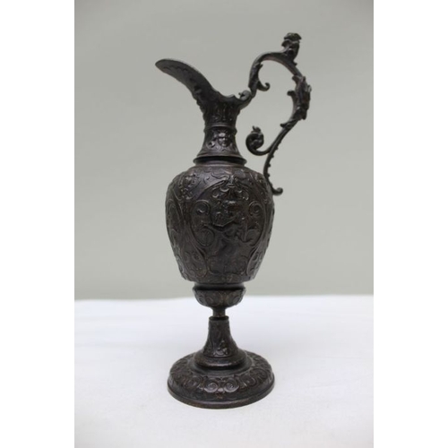 160 - A 19th century bronze ewer, 20cm, together with a cast bronze Classical male statue, 14cm