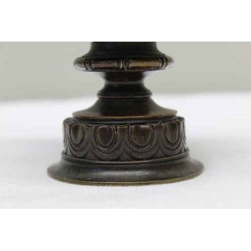 161 - A small bronze tazza, with basket cast top, 9cm