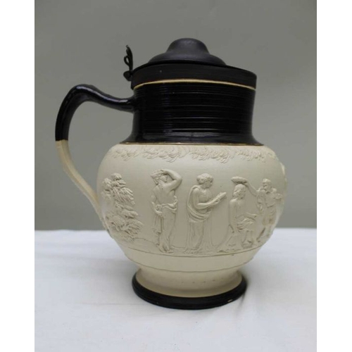 163 - An Adams late 19th century ceramic jug, decorated with moulded bacchanalian, with hinged metal lid. ... 